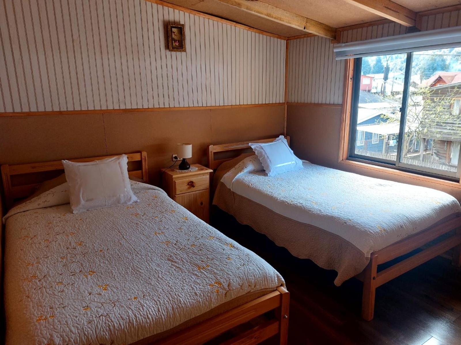 Hostal Y Cabanas Ventisquero Puerto Puyuguapi Eksteriør billede