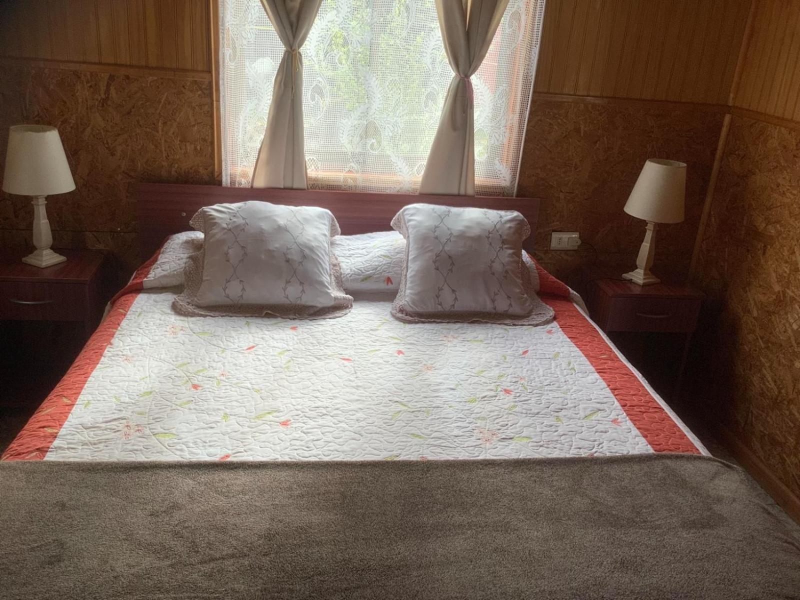 Hostal Y Cabanas Ventisquero Puerto Puyuguapi Værelse billede